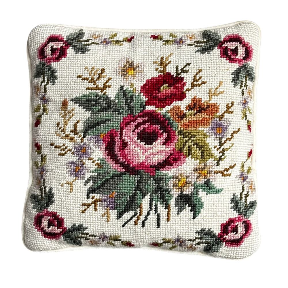Handmade needlepoint toss pillow velvet back zipper shows darkening from age